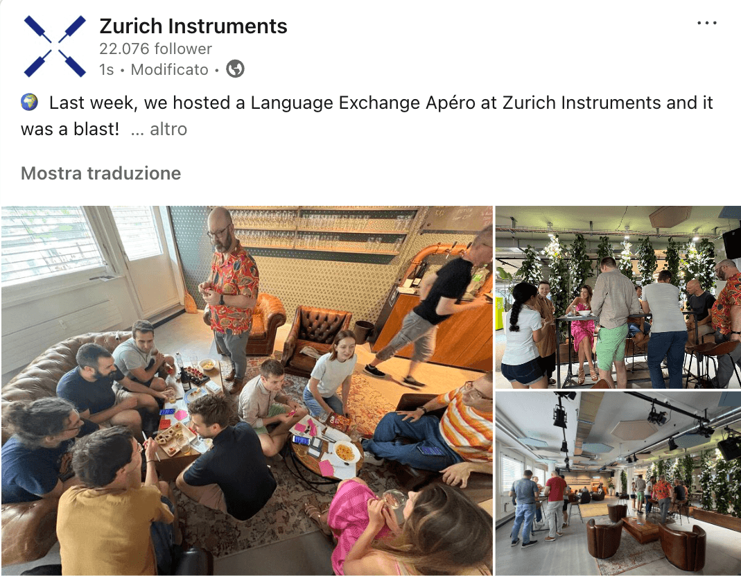 Team members engaging in language exchange during lunch exchanging any language